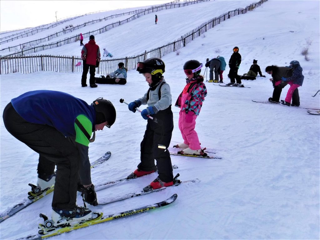 Children being taught how to ski by Liquid Footprints