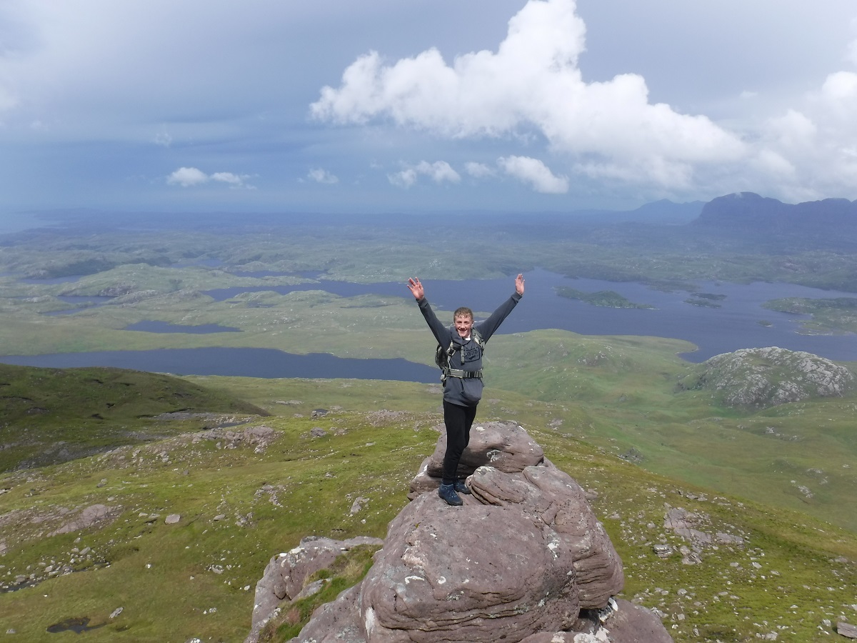 Client on top of a mountain