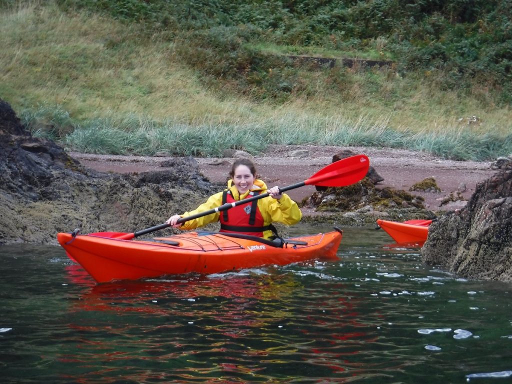 Sea kayaker smiling