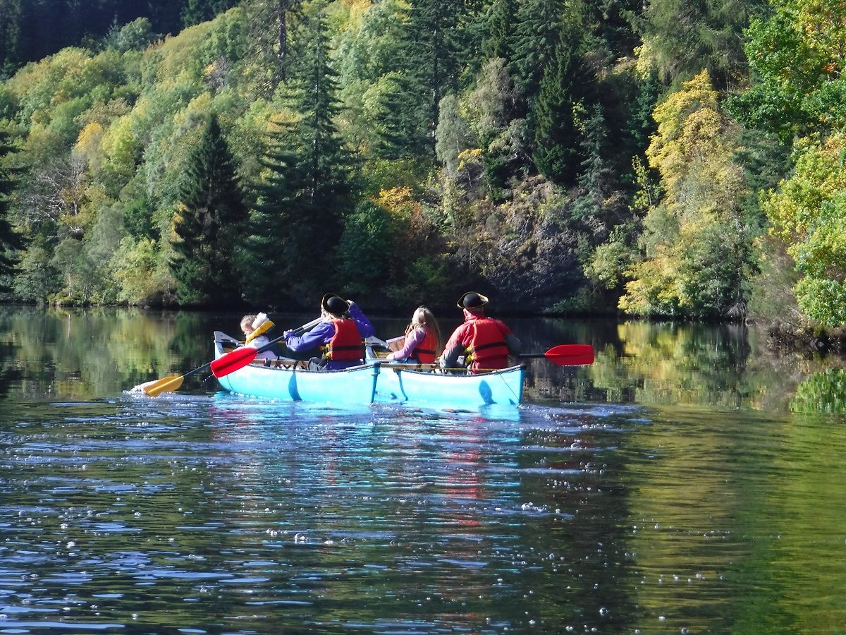 Family canoeing together