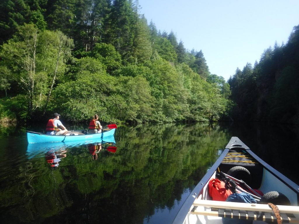 Canoeist on a gentle river