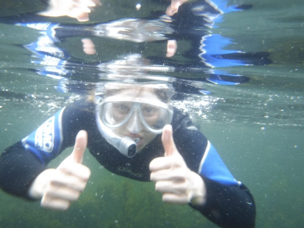 Snorkeler giving the thumbs up