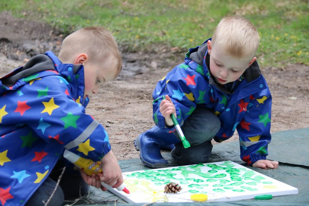 small children doing some art